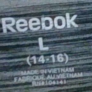 silky Reebok tee shirt